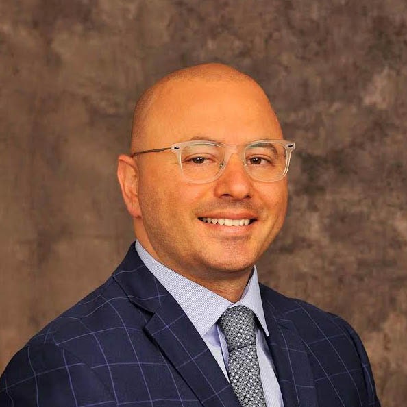 Portrait photo of doctor Alon Shalev, a dentist in Rockwall, TX